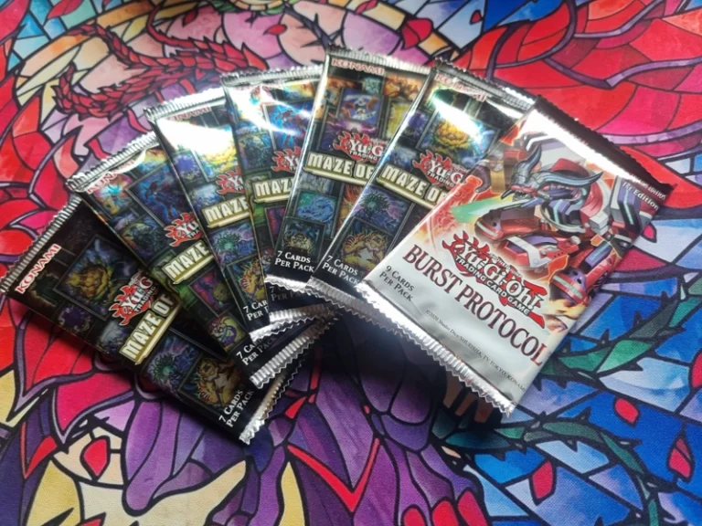 Featured image of 7 unopened booster packs for Yu-Gi-Oh! meant to indicate that the article is about Yu-Gi-Oh and trading cards